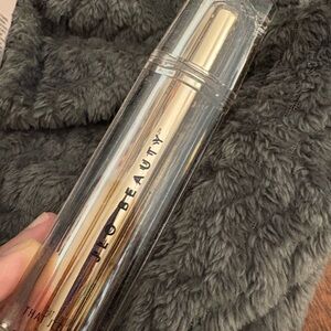 Jennifer Lopez JLo Beauty Gold and White Skincare Packaging